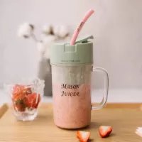 Portable rechargeable juice blender with straw.